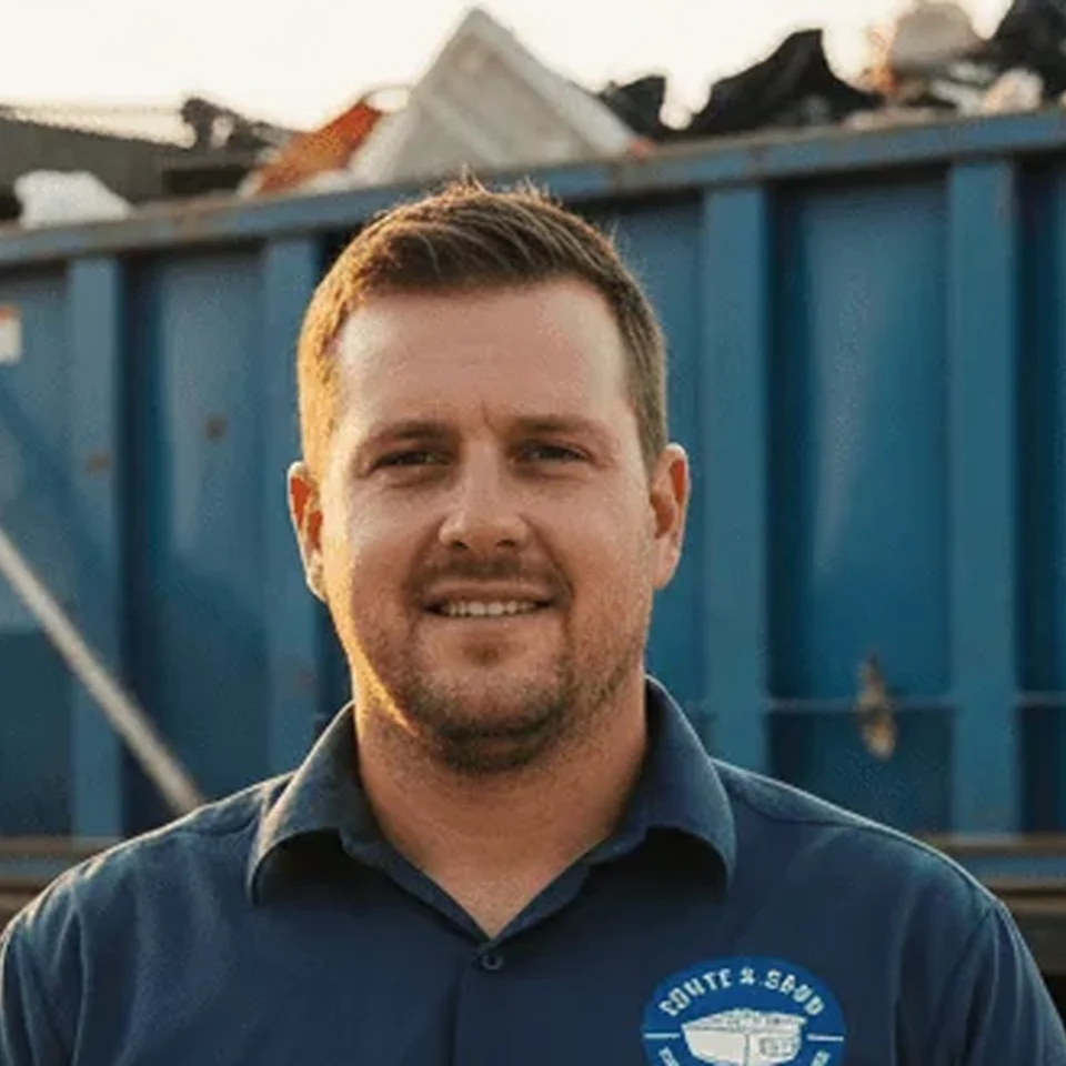 Terrell Boudreaux - Driver Terrell Boudreaux, Driver at Fonte & Sons Dumpster Rental Baton Rouge, in front of a company truck
